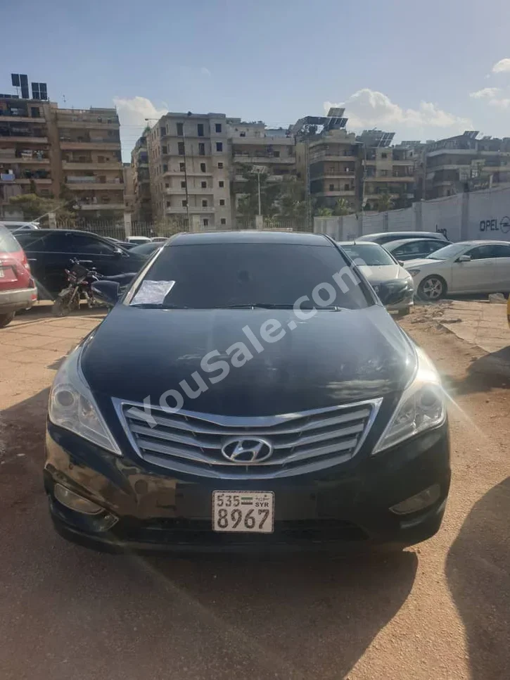 هيونداي  غراندير  2012  اتوماتيك  200,000 كم  6 سلندر  دفع أمامي  سيدان  أسود  بنزين