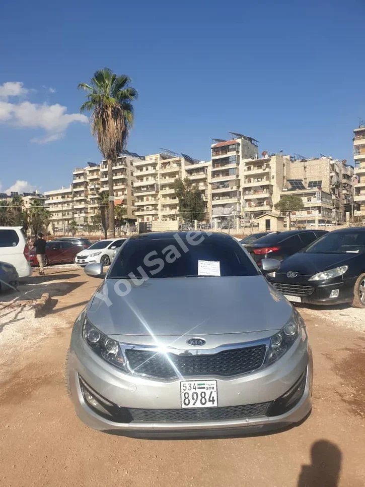 Kia  K5  2011  Automatic  212,000 km  4 Cylinder  FWD  Sedan  Silver  Gasoline