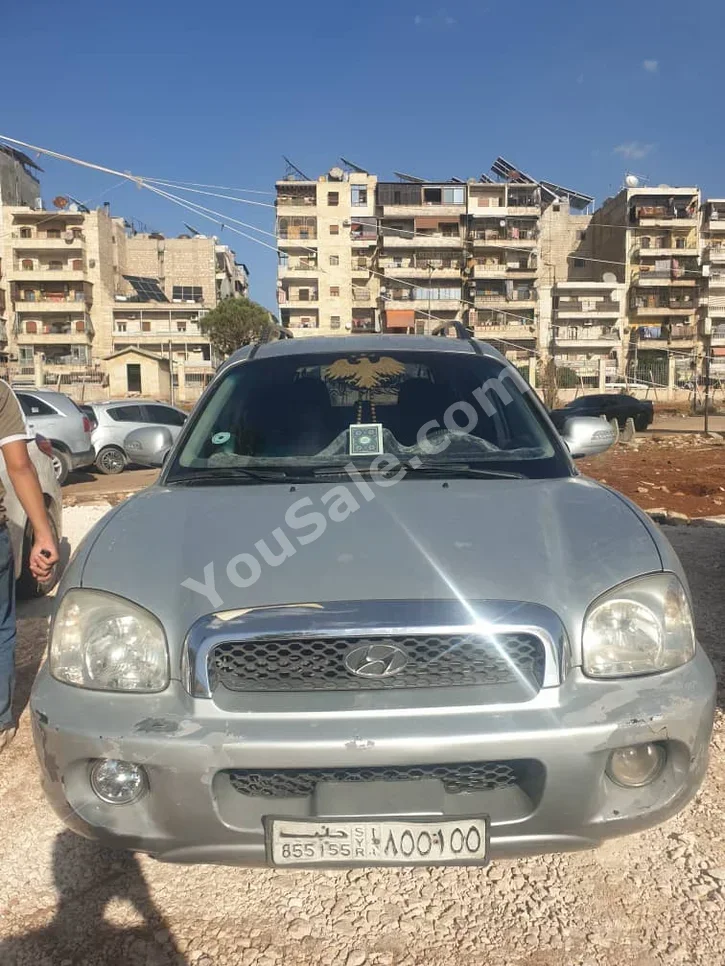 Hyundai  Santa Fe  2005  Automatic  275,000 km  4 Cylinder  FWD  SUV  Silver  Gasoline