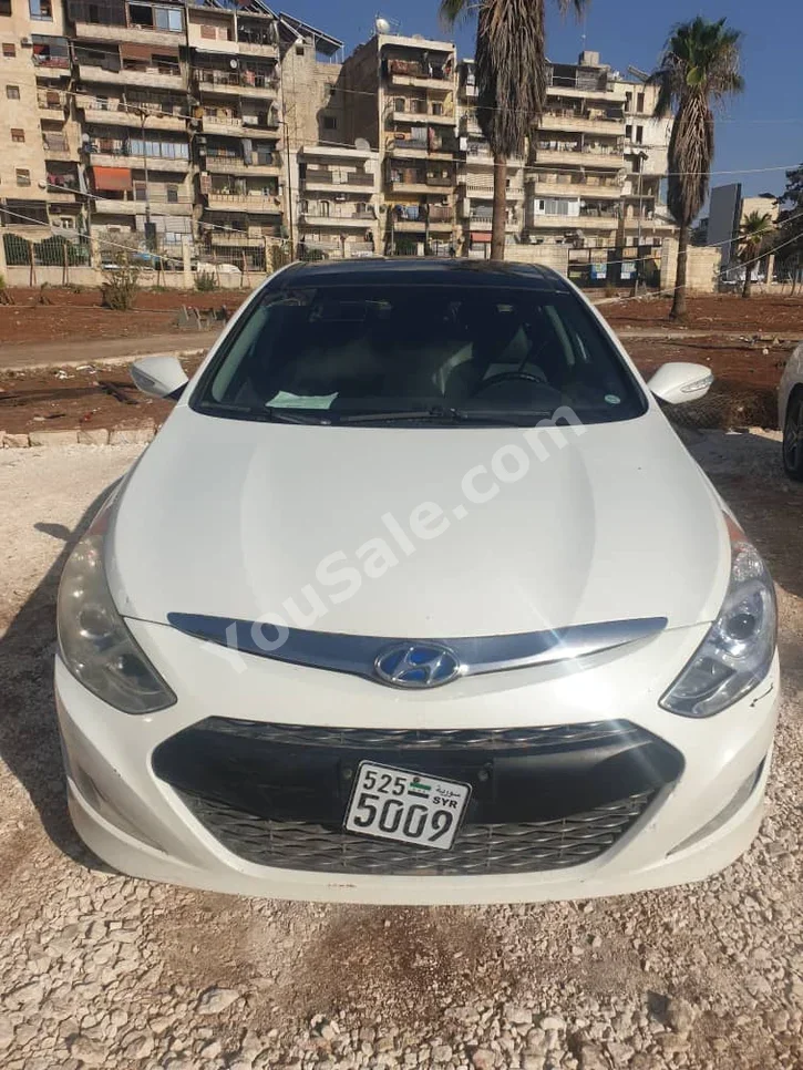 Hyundai Sonata 2014 Automatic 175,000 km 4 Cylinder FWD Sedan White Hybrid