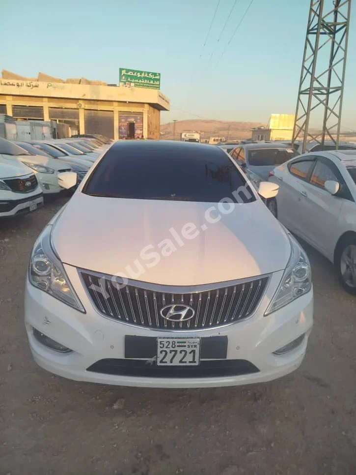 هيونداي  غراندير  2014  اتوماتيك  180,000 كم  6 سلندر  دفع أمامي  سيدان  أبيض  بنزين