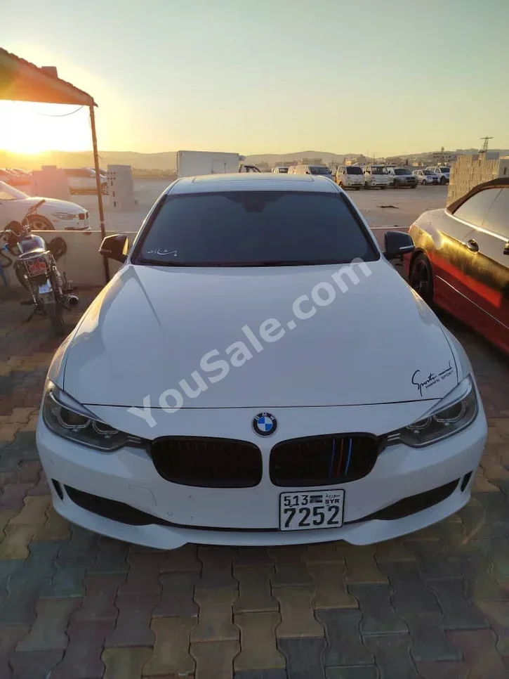 BMW  3-Series  320  2014  Automatic  183,000 km  4 Cylinder  RWD  Sedan  White  Diesel