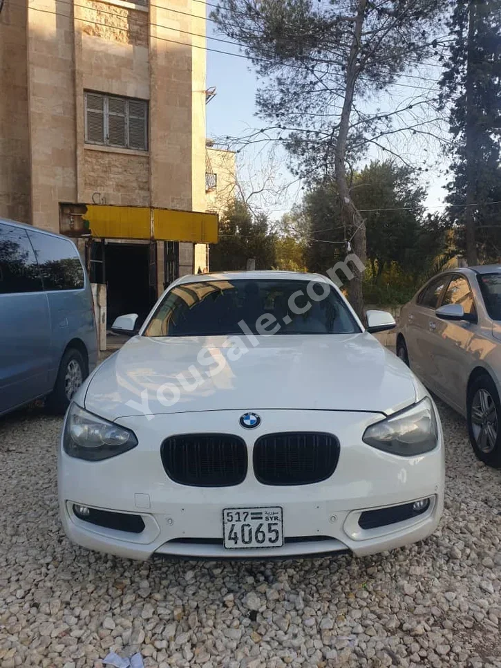 BMW  5-Series  520i  2014  Automatic  93,000 km  4 Cylinder  RWD  Hatchback  White  Gasoline