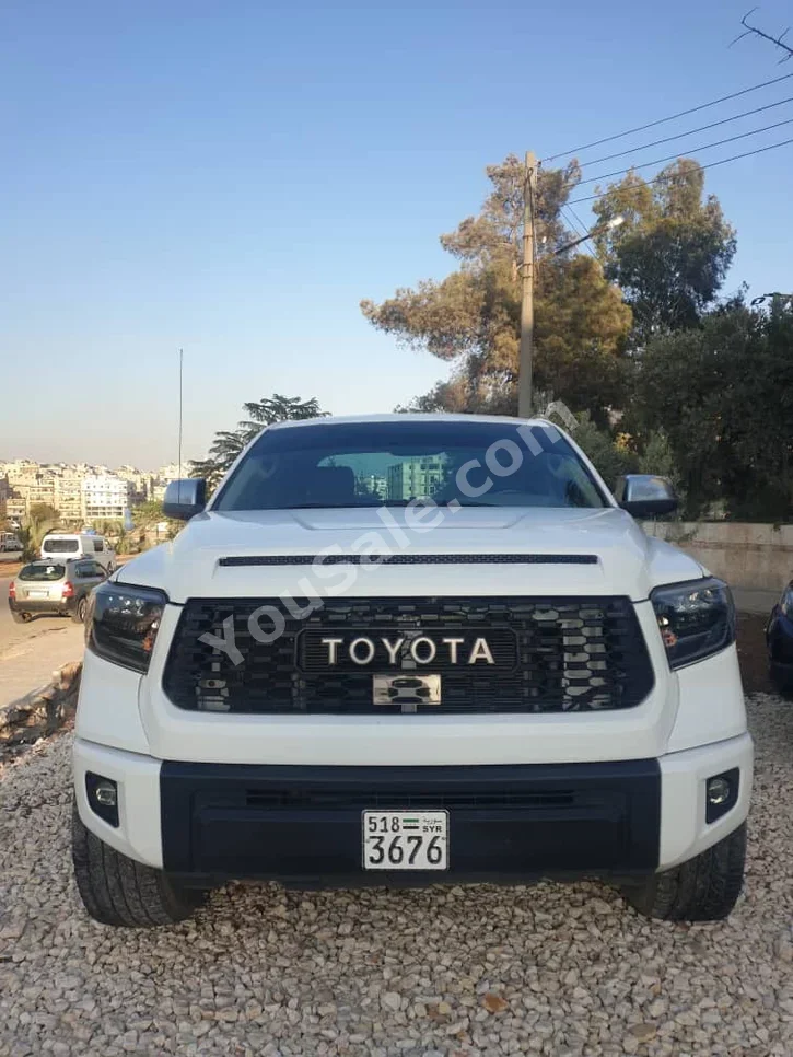 تويوتا تندرا 2007 اتوماتيك 113,000 كم 8 سلندر دفع رباعي بيكب أبيض بنزين