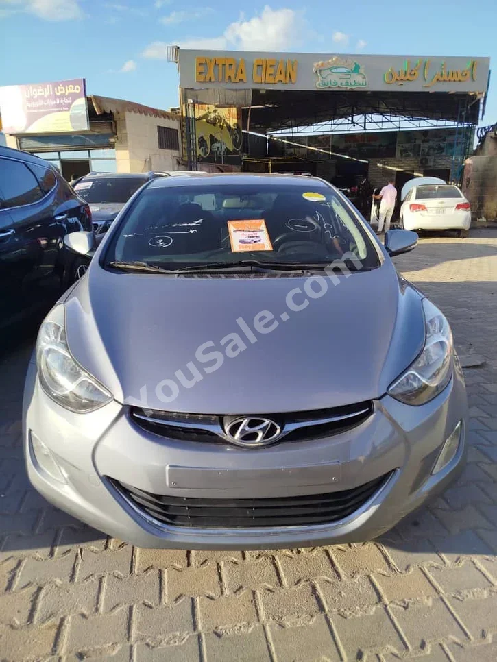 Hyundai  Avante  2011  Automatic  260,000 km  4 Cylinder  FWD  Sedan  Dark Gray  Gasoline