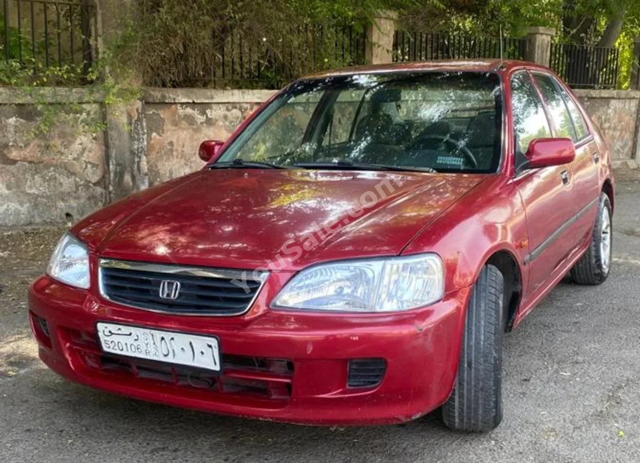 هوندا سيتي 2002 اتوماتيك 199,000 كم 4 سلندر دفع أمامي سيدان أحمر بنزين