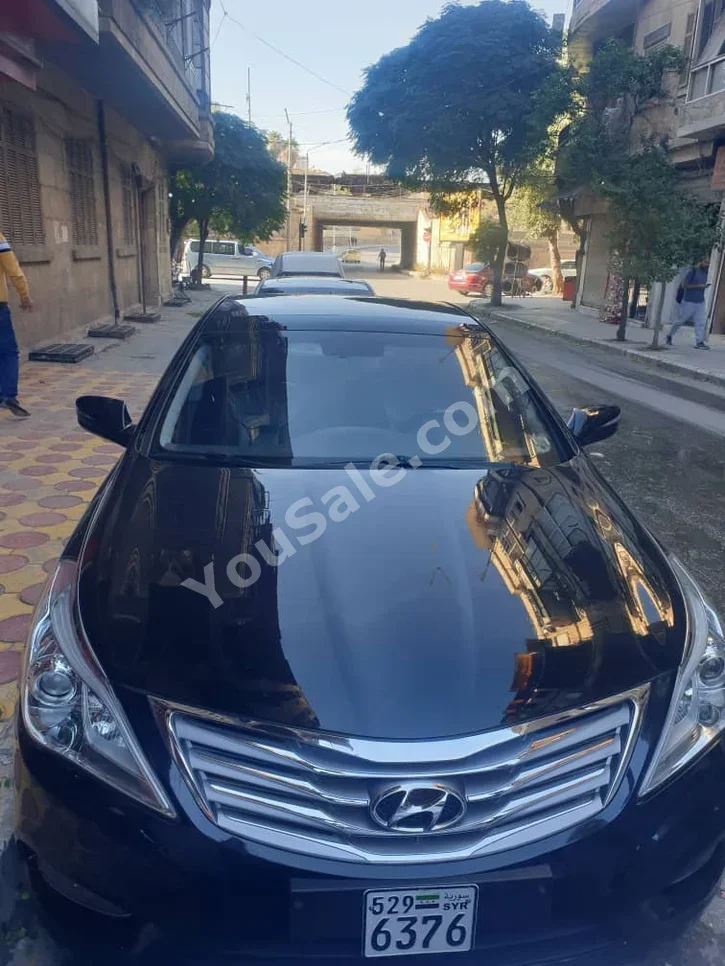 هيونداي  غراندير  2012  اتوماتيك  155,000 كم  6 سلندر  دفع أمامي  سيدان  أسود  بنزين