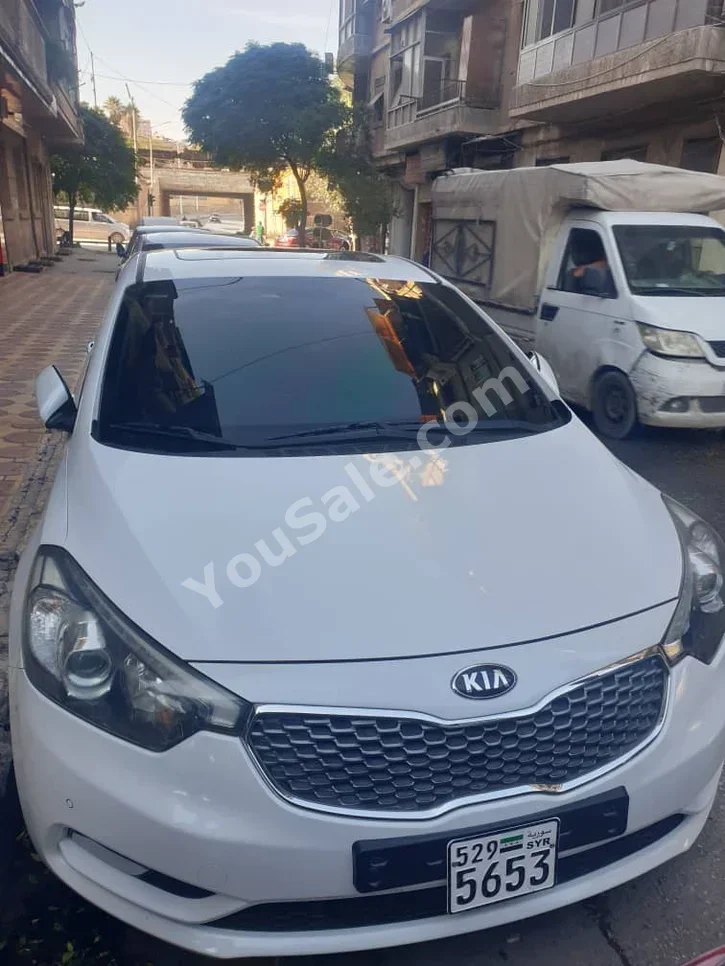 Kia K3 2013 Automatic 94,000 km 4 Cylinder FWD Sedan White Gasoline