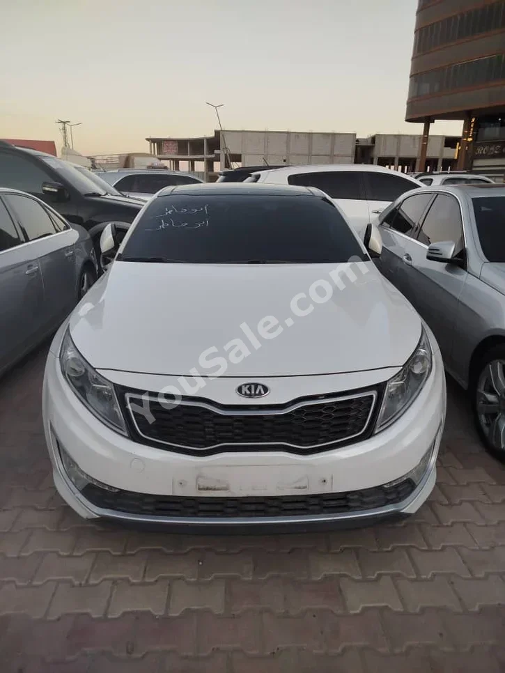Kia  K5  2013  Automatic  290,000 km  4 Cylinder  FWD  Sedan  White  Hybrid