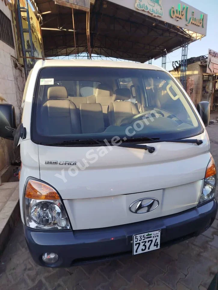 Hyundai  Porter  Porter  2009  Automatic  135,000 km  4 Cylinder  RWD  Pick Up  White  Diesel