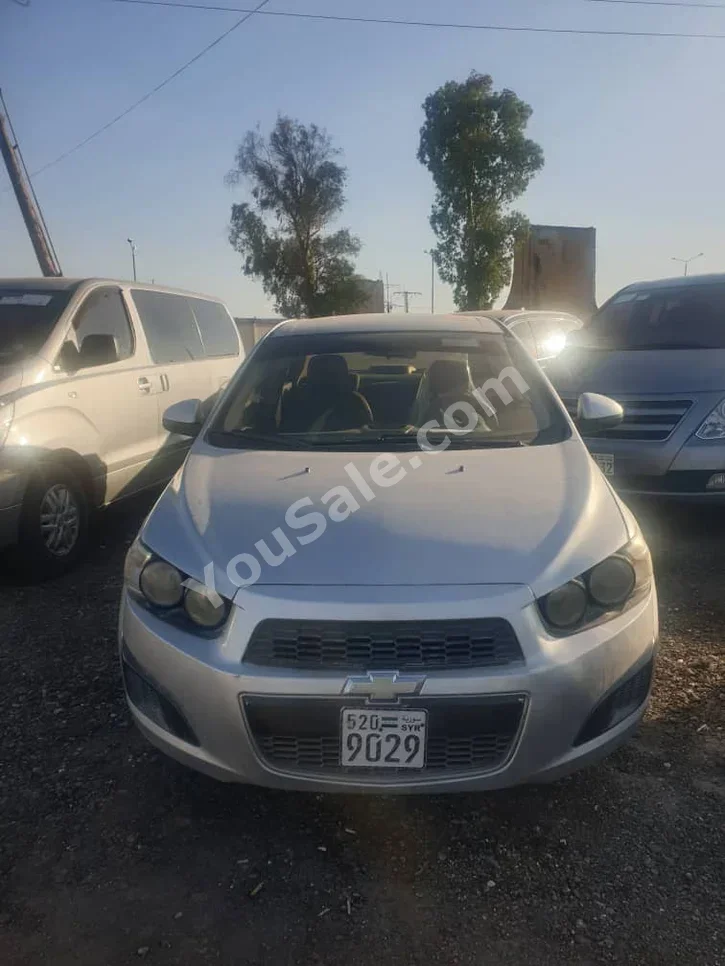 Chevrolet Sonic 2014 Automatic 196,000 km 4 Cylinder FWD Sedan Silver Gasoline