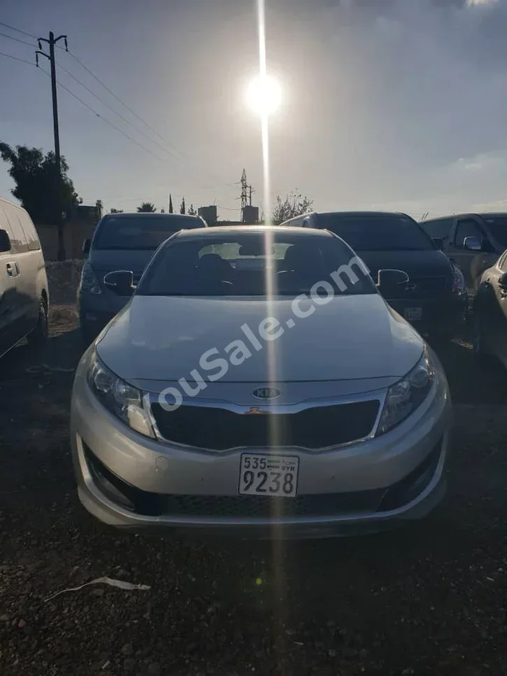 Kia  K5  2011  Automatic  241,000 km  4 Cylinder  FWD  Sedan  Silver  Gasoline