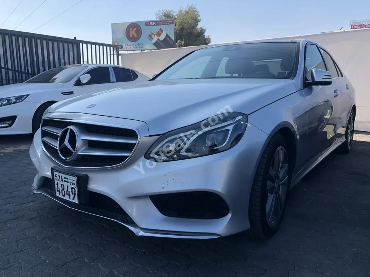 Mercedes-Benz  E-Class  350  2016  Automatic  165,000 km  4 Cylinder  4WD  Sedan  Silver  Gasoline