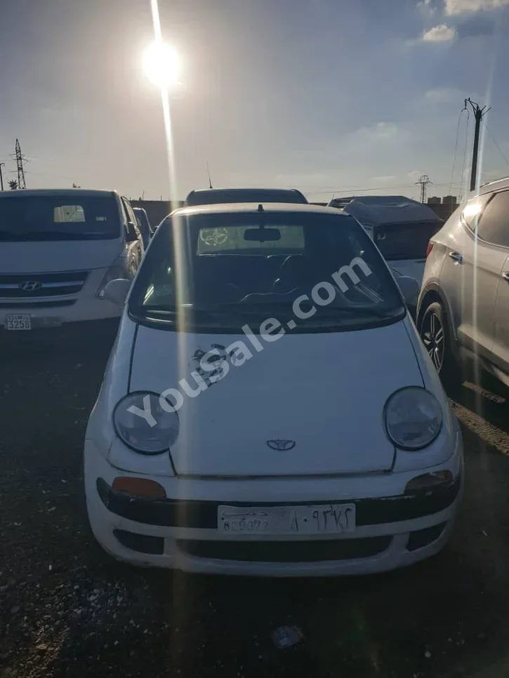 Daewoo  Matiz  2001  Automatic  291,000 km  4 Cylinder  FWD  Hatchback  White  Gasoline