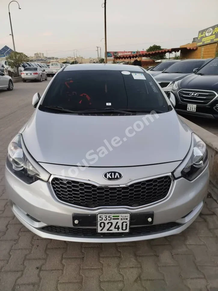 Kia  K3  2013  Automatic  120,000 km  4 Cylinder  FWD  Sedan  Silver  Gasoline