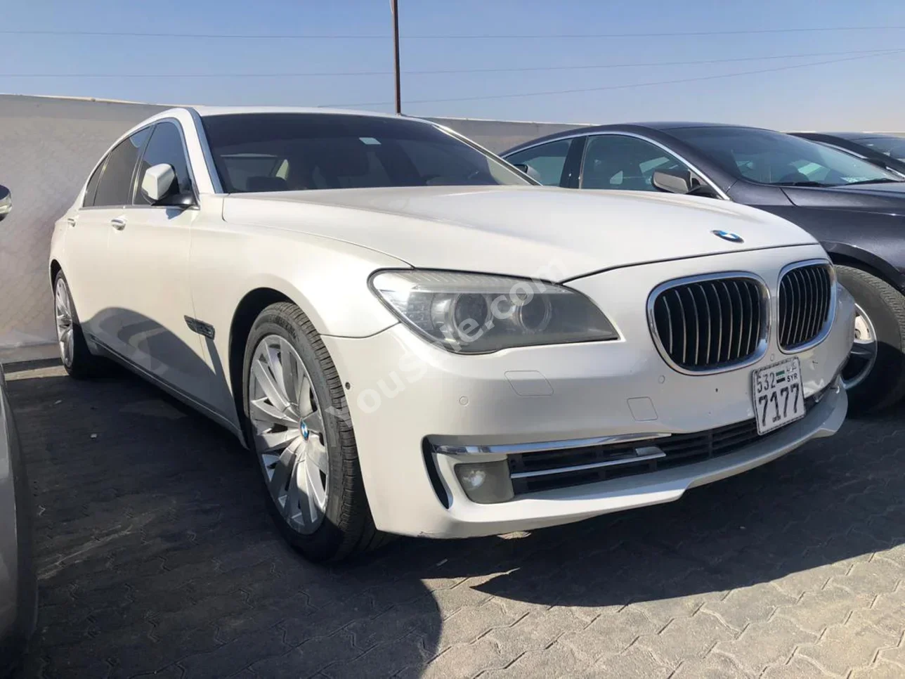 BMW  7-Series  740  2013  Automatic  207,000 km  6 Cylinder  RWD  Sedan  White  Gasoline