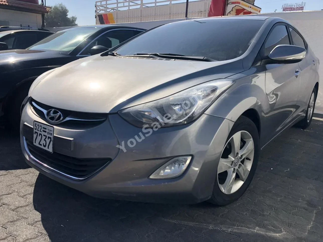 Hyundai  Avante  2011  Automatic  148,000 km  4 Cylinder  FWD  Sedan  Dark Gray  Gasoline