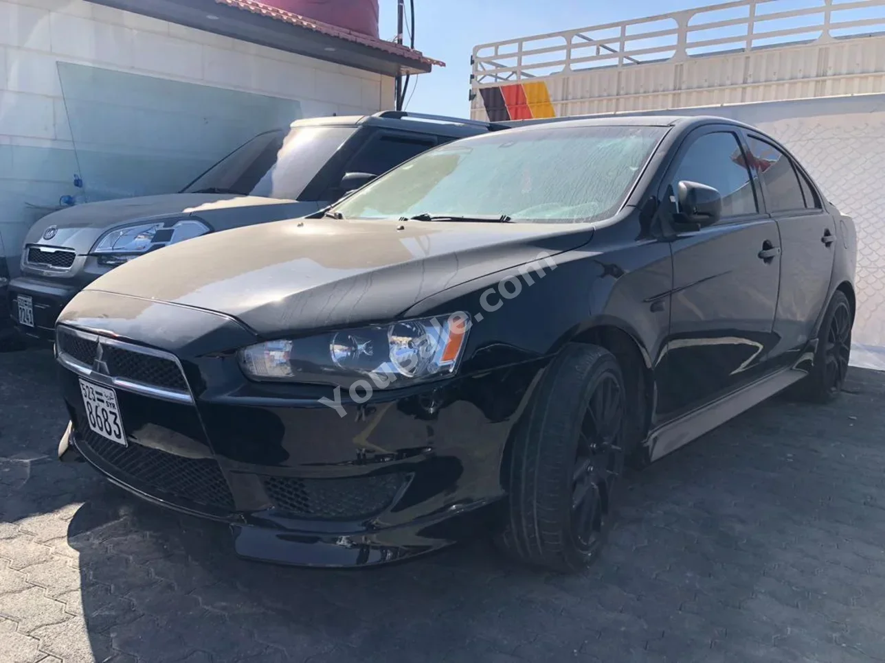 Mitsubishi Lancer 2014 Automatic 78,000 km 4 Cylinder FWD Sedan Black Gasoline