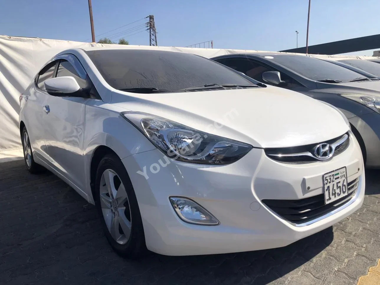 Hyundai  Avante  2011  Automatic  188,000 km  4 Cylinder  FWD  Sedan  White  Gasoline