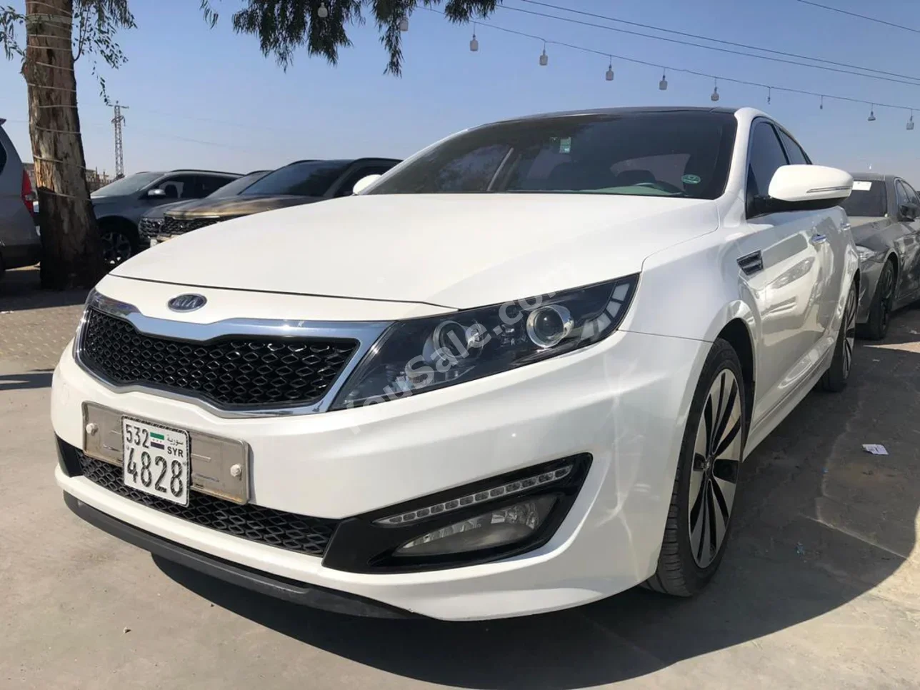 Kia  K5  2011  Automatic  88,000 km  4 Cylinder  FWD  Sedan  White  Gasoline