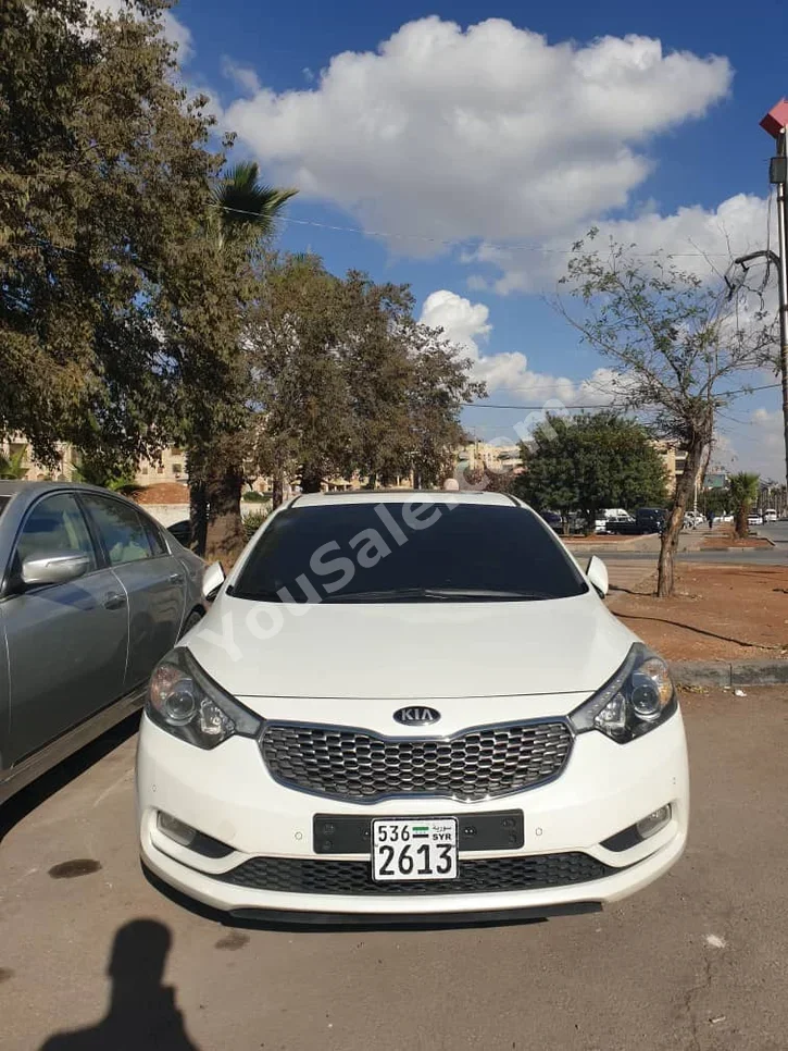 Kia  K3  2011  Automatic  120,000 km  4 Cylinder  FWD  Sedan  White  Gasoline