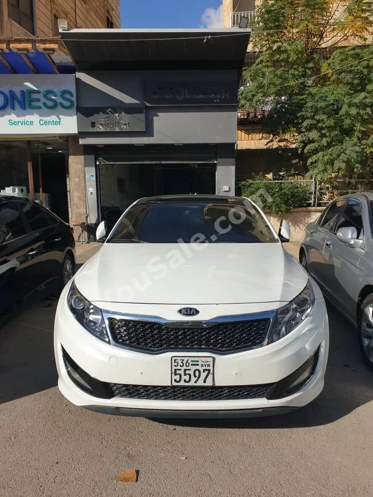 Kia  K5  2011  Automatic  170,000 km  4 Cylinder  FWD  Sedan  White  Gasoline