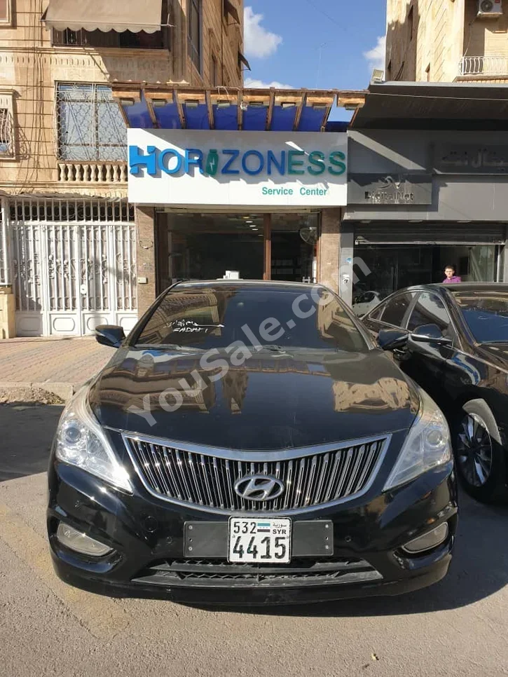 Hyundai Grandeur 2014 Automatic 70,000 km 6 Cylinder FWD Sedan Black Gasoline