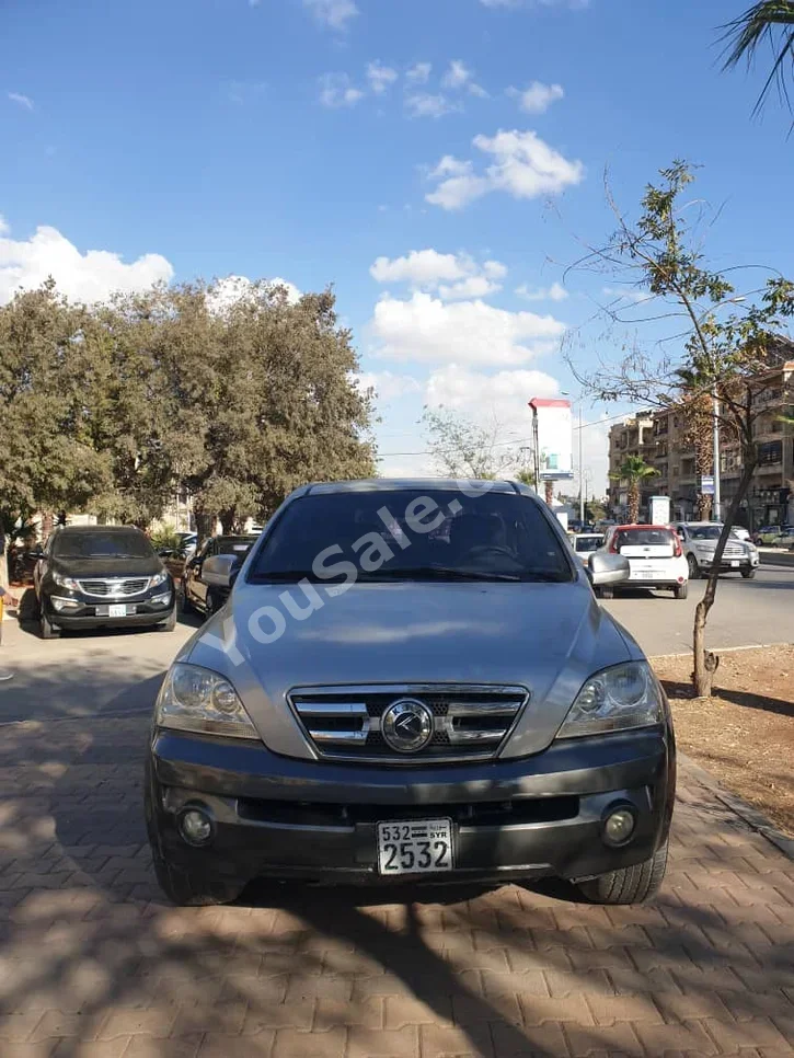 Kia  Sorento  2003  Automatic  200,000 km  4 Cylinder  FWD  SUV  Silver  Diesel