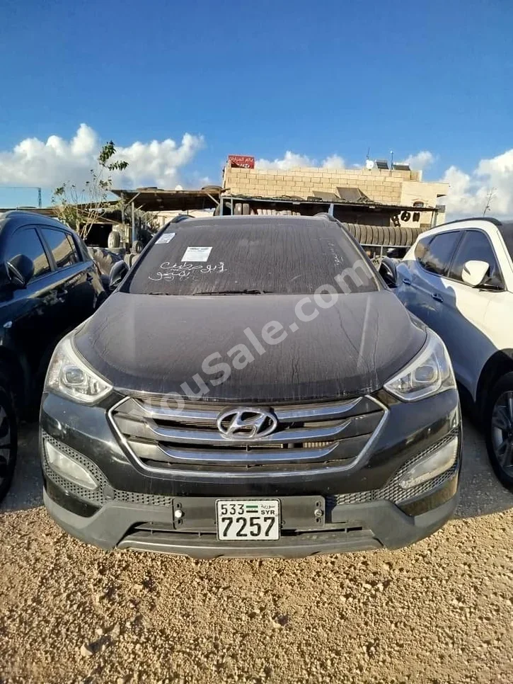 Hyundai  Santa Fe  2014  Automatic  140,000 km  4 Cylinder  FWD  SUV  Black  Diesel