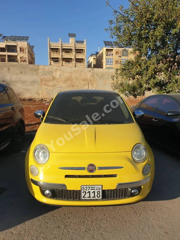 فيات 500 2013 اتوماتيك 164,000 كم 4 سلندر دفع أمامي هاتشباك أصفر بنزين
