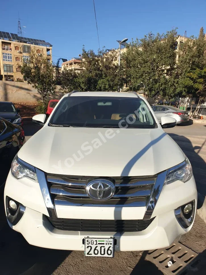 Toyota  Fortuner  2020  Automatic  163,000 km  6 Cylinder  4WD  SUV  White  Gasoline