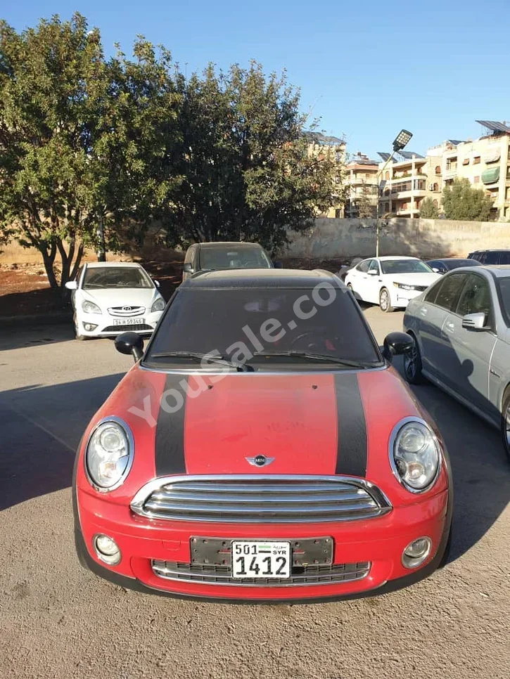 Mini  Cooper  Clubman S  2011  Automatic  122,000 km  4 Cylinder  FWD  Hatchback  Red  Gasoline