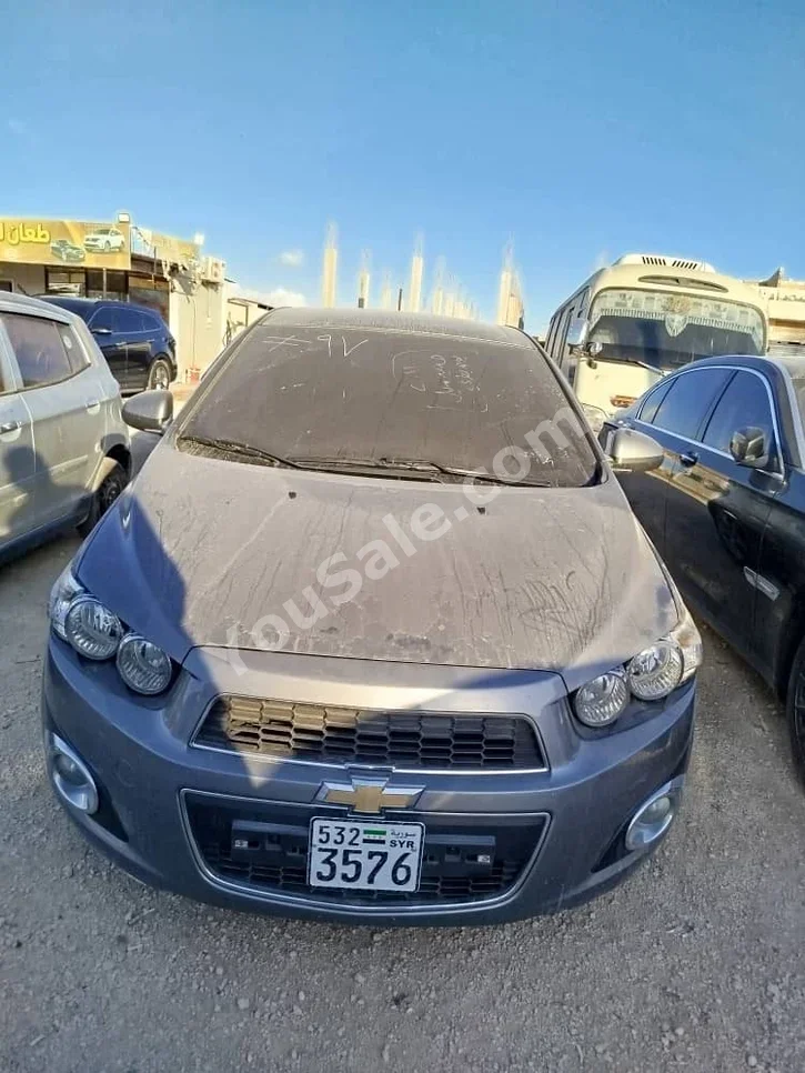 Chevrolet  Aveo  2011  Automatic  140,000 km  4 Cylinder  FWD  Hatchback  Dark Gray  Gasoline