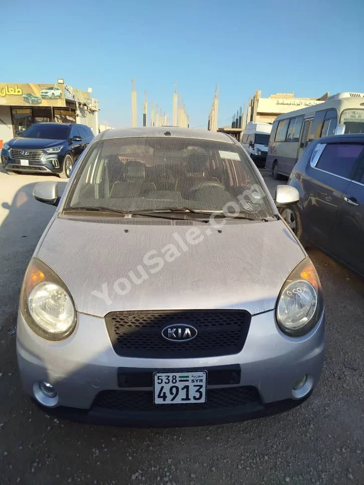 Kia  Picanto  2010  Automatic  140,000 km  4 Cylinder  FWD  Hatchback  Silver  Gasoline