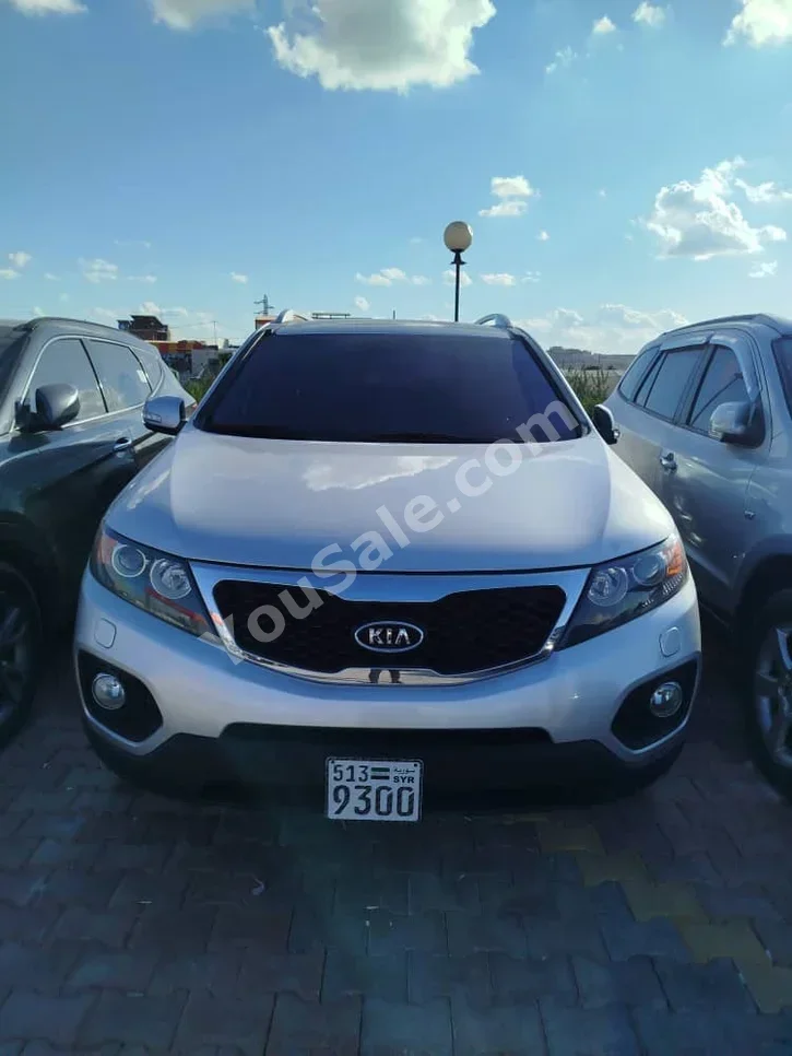 Kia  Sorento  2012  Automatic  190,000 km  4 Cylinder  FWD  SUV  Silver  Diesel