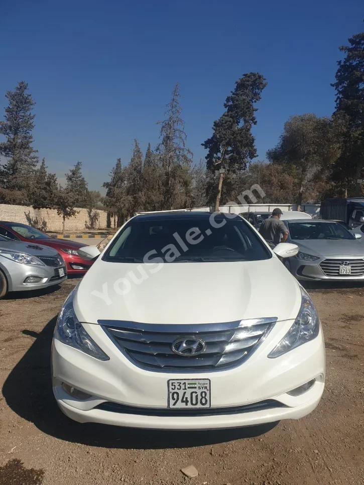 Hyundai  Sonata  2012  Automatic  136,000 km  4 Cylinder  FWD  Sedan  White  Gasoline