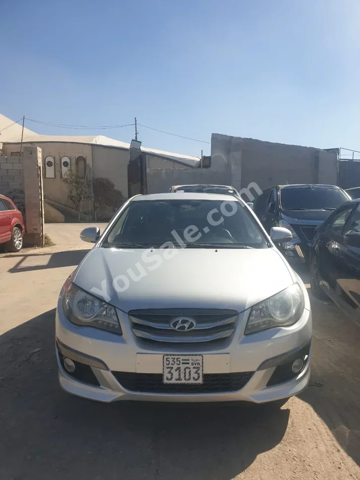 Hyundai  Avante  2011  Automatic  186,000 km  4 Cylinder  FWD  Sedan  Silver  Gasoline