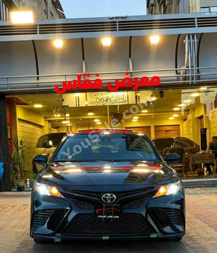 Toyota  Camry  SE  2018  Automatic  140,000 km  4 Cylinder  FWD  Sedan  Black  Gasoline