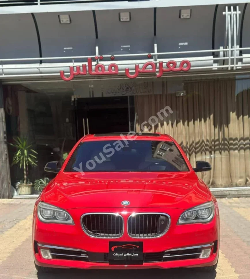 BMW 7-Series 750 Li 2013 Automatic 98,000 km 6 Cylinder 4WD Sedan Red Gasoline