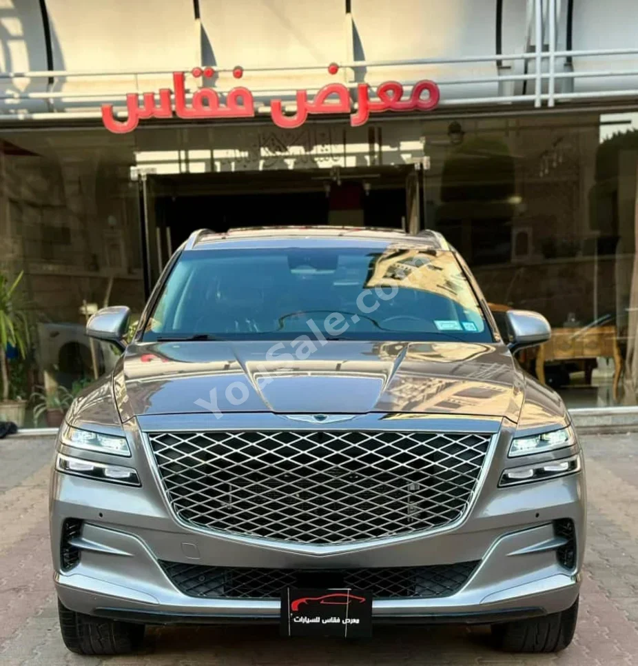 Genesis  GV80  2021  Automatic  60,000 km  6 Cylinder  4WD  SUV  Light Gold  Gasoline