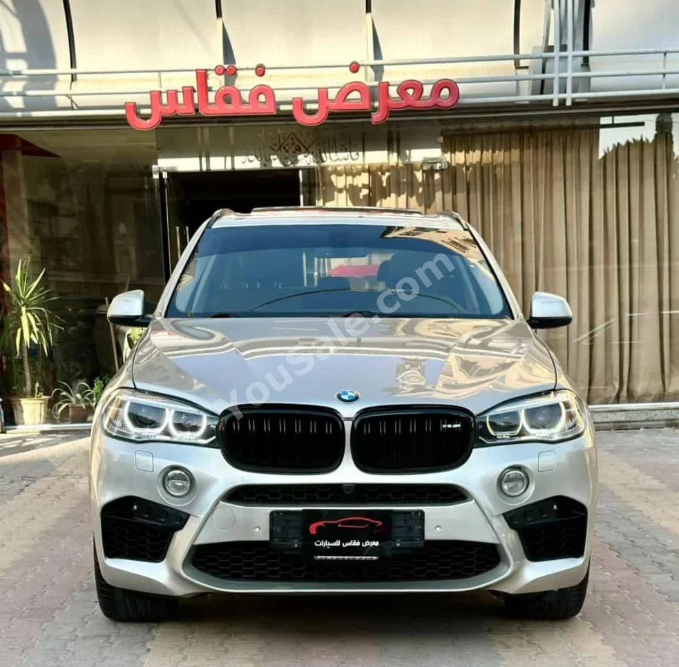 BMW  X-Series  5  2014  Automatic  89,000 km  6 Cylinder  4WD  SUV  Light Gold  Gasoline