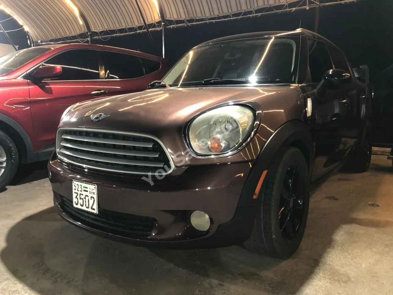 Mini  Cooper  2013  Automatic  211,000 km  4 Cylinder  FWD  Sedan  Brown  Gasoline
