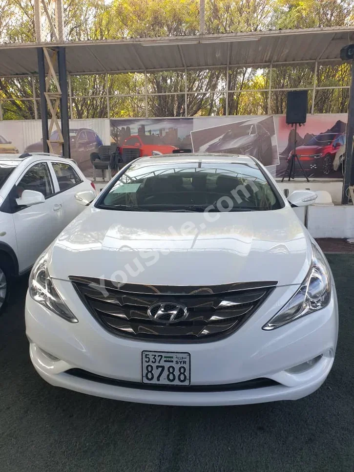 Hyundai  Sonata  2011  Automatic  234,000 km  4 Cylinder  FWD  Sedan  White  Gasoline