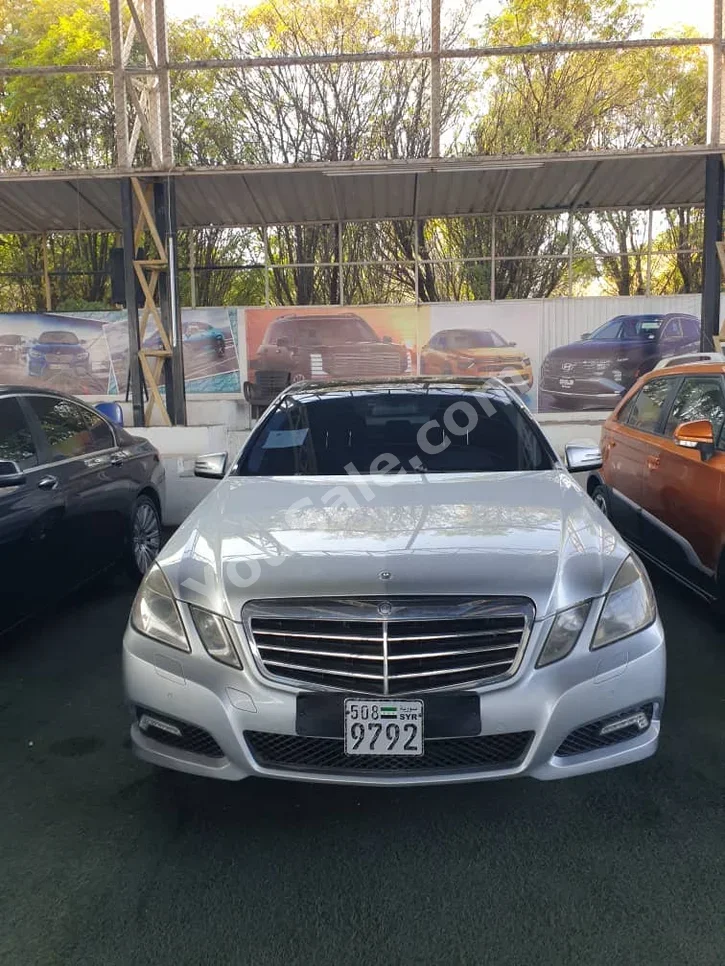 Mercedes-Benz  E-Class  350  2012  Automatic  152,000 km  6 Cylinder  4WD  Sedan  Silver  Gasoline