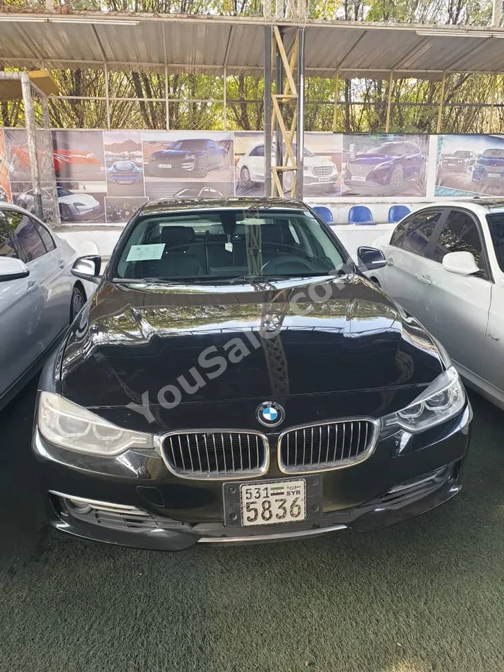 BMW 3-Series 328i 2012 Automatic 300,000 km 4 Cylinder RWD Sedan Black Gasoline