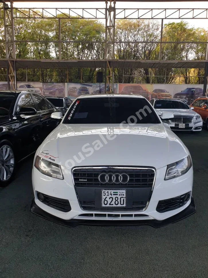 Audi  A4  2.0 T  2010  Automatic  167,000 km  4 Cylinder  RWD  Sedan  White  Gasoline