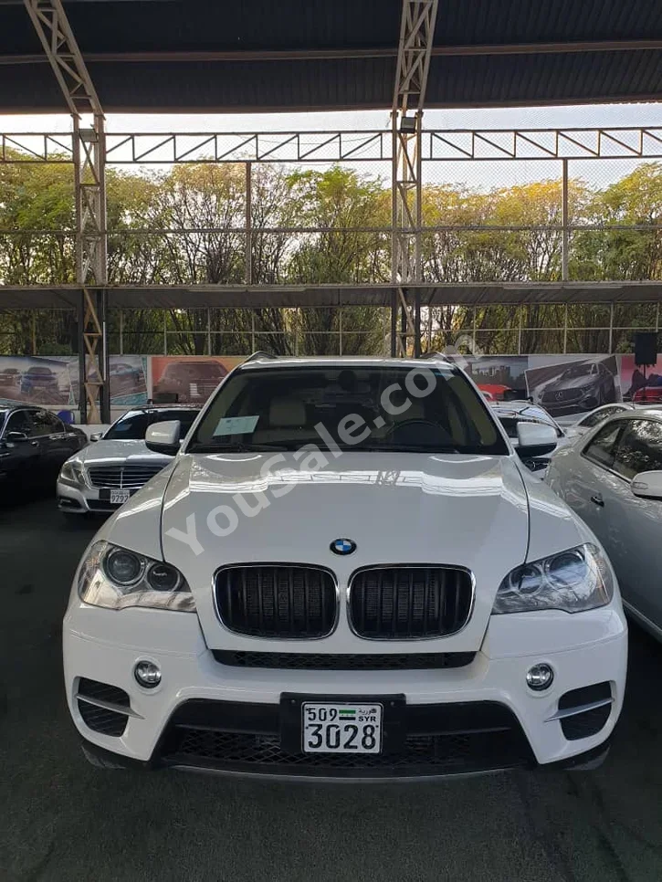 BMW  X-Series  5  2012  Automatic  135,000 km  6 Cylinder  4WD  SUV  White  Gasoline