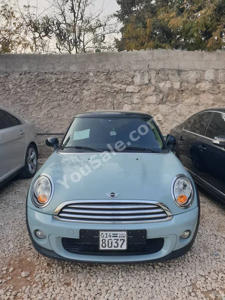 Mini Cooper 2013 Automatic 335,000 km 4 Cylinder FWD Coupe / Sport Turquoise Diesel