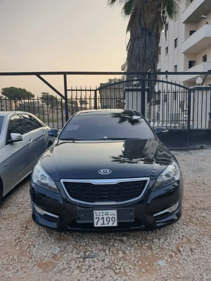 Kia  K7  2012  Automatic  179,000 km  4 Cylinder  FWD  Sedan  Black  Gasoline