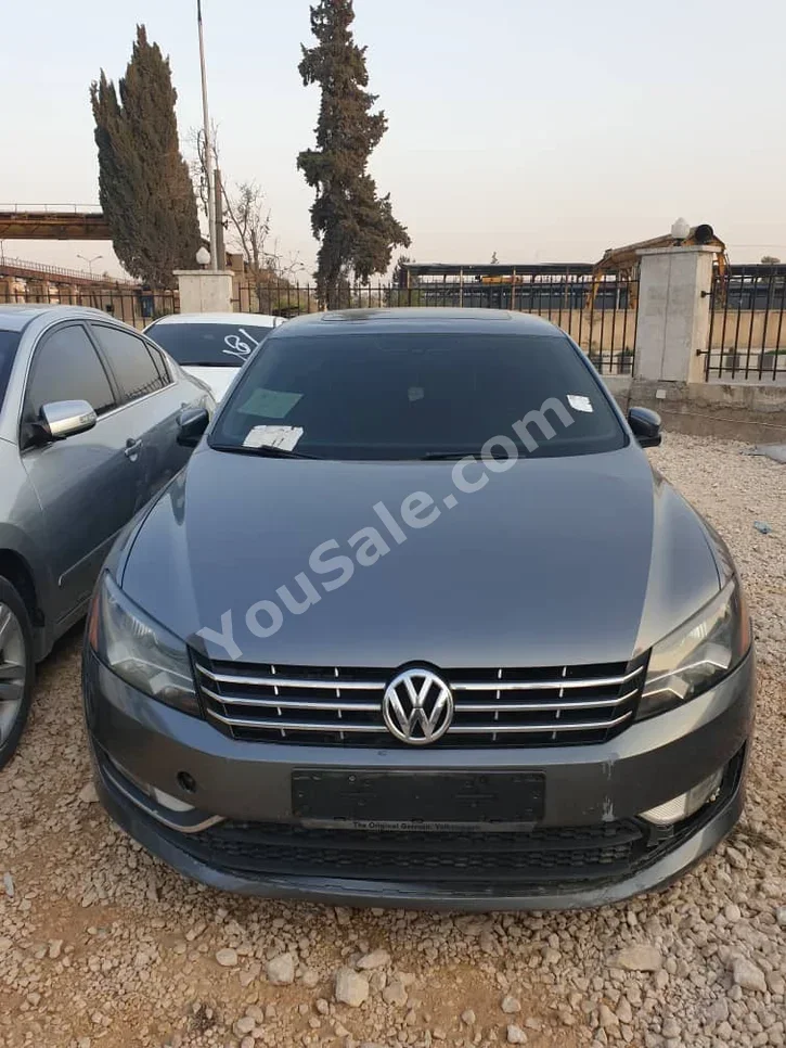 Volkswagen  Passat  2013  Automatic  339,000 km  4 Cylinder  FWD  Sedan  Dark Gray  Diesel